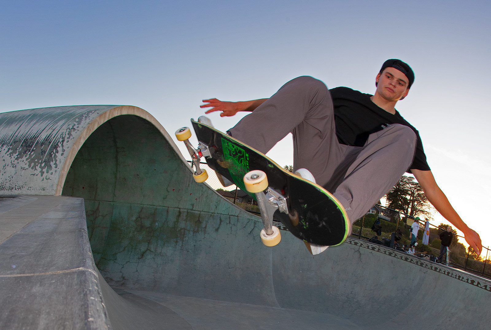 Skateboarder Nikki Rodger catching air at Mike Fox Skate Park in Santa Cruz, CA