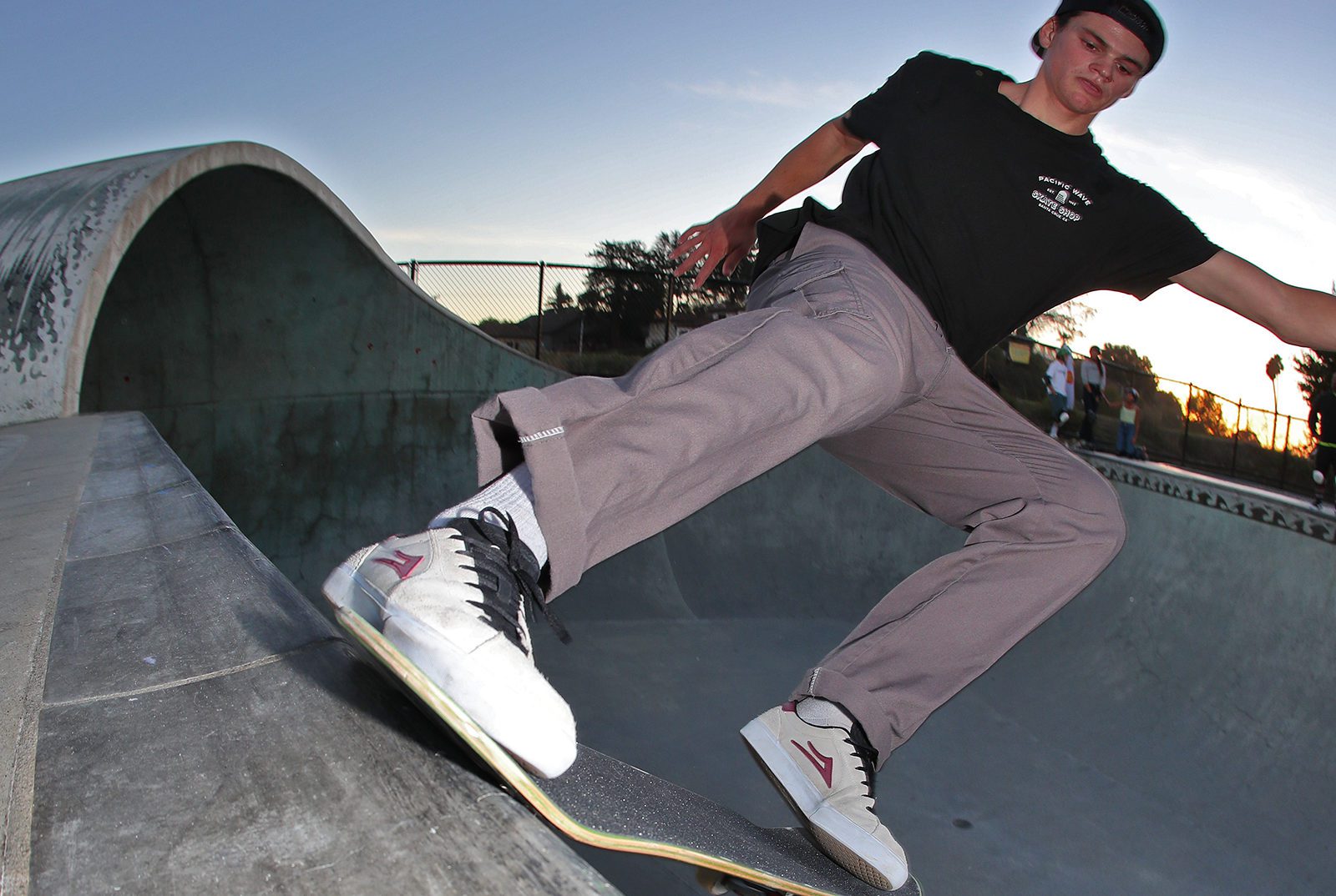 Skateboarder Nikki Rodger transitions to tailslide at Mike Fox Skate Park in Santa Cruz, CA