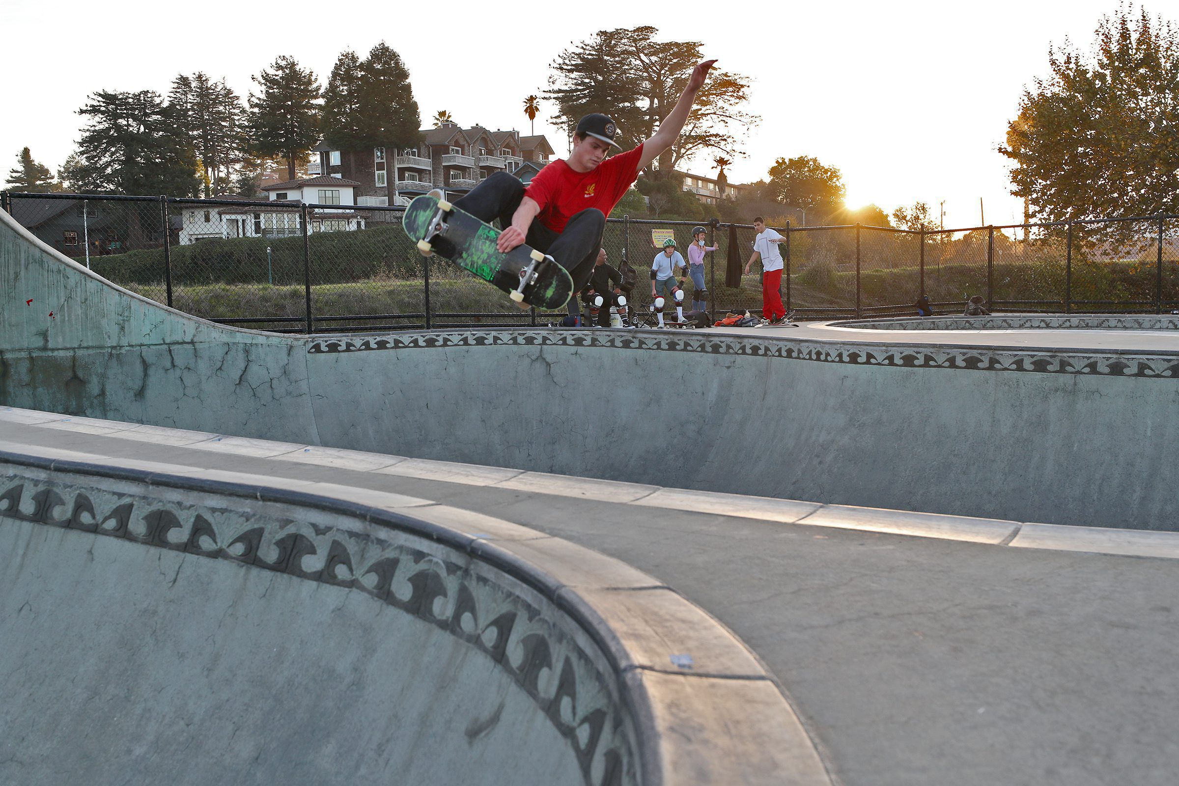 Skateboarder Nikki Rodger catching air at Mike Fox Skate Park in Santa Cruz, CA